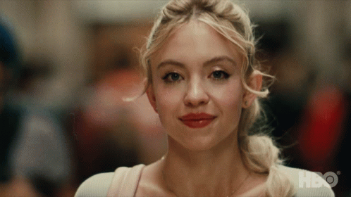 A Close Up Of A Woman 'S Face With Hbo Written On The Bottom GIF