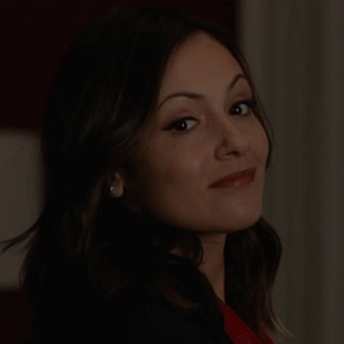 A Close Up Of A Woman 'S Face With Her Eyes Closed GIF