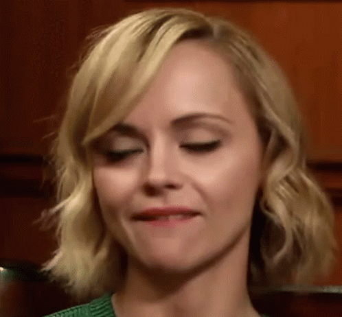 Woman With Eyes Closed Close Up GIF