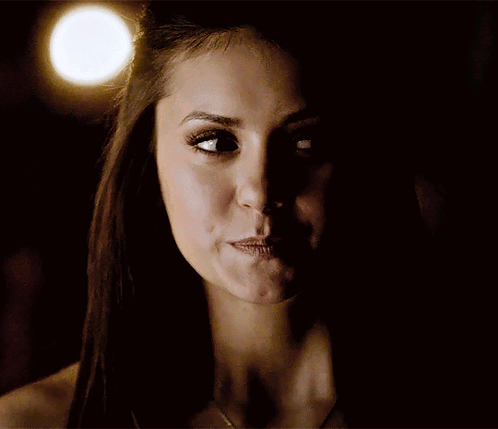 A Close Up Of A Woman 'S Face With Her Eyes Closed GIF