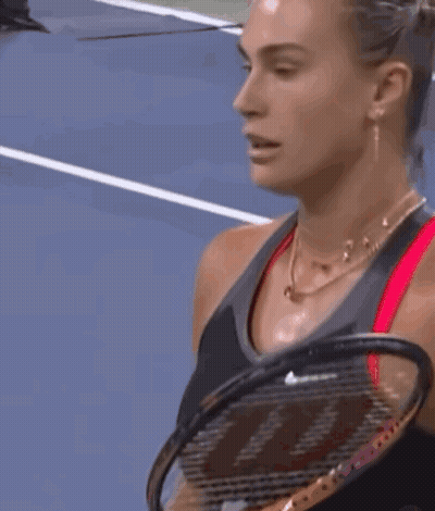 A Close Up Of A Woman 'S Face With Her Eyes Closed GIF