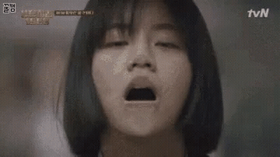 A Close Up Of A Woman 'S Face With Her Mouth Open And The Word Tvn In The Corner . GIF