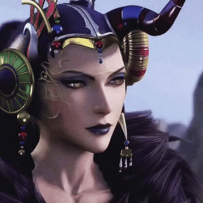 A Close Up Of A Woman 'S Face With Horns On Her Head GIF