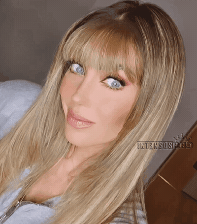 A Close Up Of A Woman 'S Face With Intensospeed Written Below Her GIF