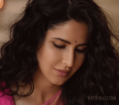 A Close Up Of A Woman 'S Face With Katrinasstan Written On The Bottom Right GIF