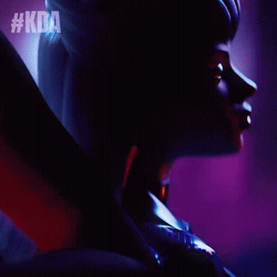 A Close Up Of A Woman 'S Face With #Kda Written On The Bottom Right GIF
