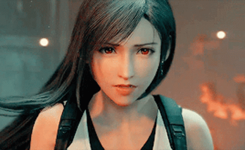 A Close Up Of A Woman 'S Face With Long Black Hair And Red Eyes GIF