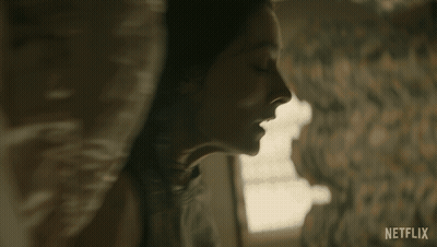 A Close Up Of A Woman 'S Face With Netflix Written In The Bottom Right Corner GIF