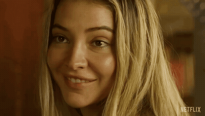 A Close Up Of A Woman 'S Face With Netflix Written In The Corner GIF