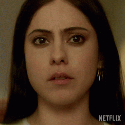 Close Up Of Woman's Face With Netflix Text GIF