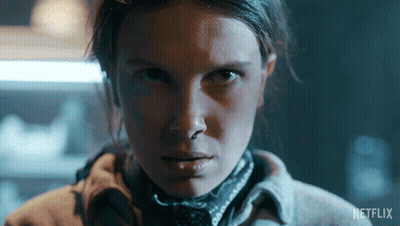 A Close Up Of A Woman 'S Face With Netflix Written On The Bottom Right GIF