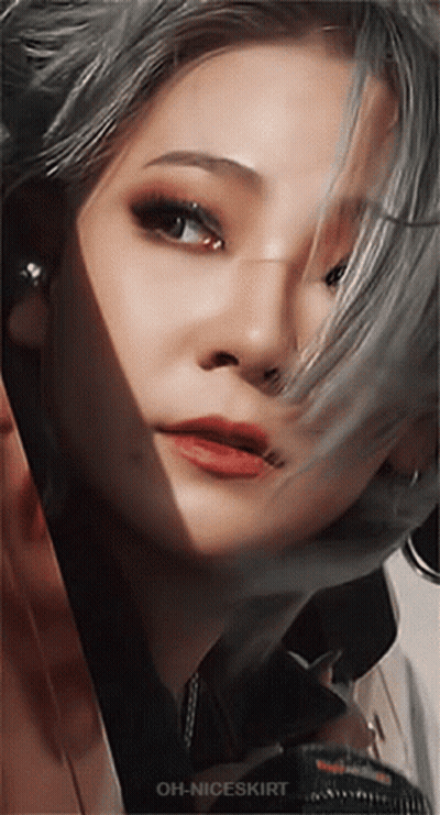 A Close Up Of A Woman 'S Face With Oh-Niceskirt Written On The Bottom Right GIF