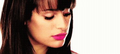 A Close Up Of A Woman 'S Face With Pink Lipstick On GIF