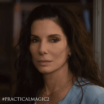 A Close Up Of A Woman 'S Face With # Practicalmagic2 Written Below Her GIF