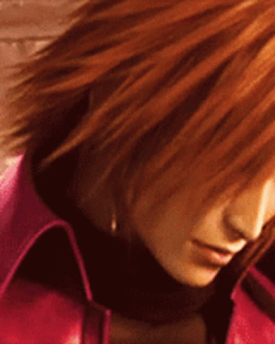 A Close Up Of A Woman 'S Face With Red Hair And A Pink Jacket GIF
