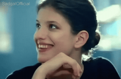 A Close Up Of A Woman 'S Face With Sadgal Official Written Above Her GIF