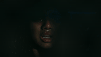 A Close Up Of A Woman 'S Face With Tears Running Down Her Cheeks GIF