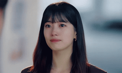 A Close Up Of A Woman 'S Face With Tears Running Down Her Face GIF