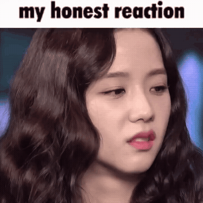 A Close Up Of A Woman 'S Face With The Caption `` My Honest Reaction '' . GIF