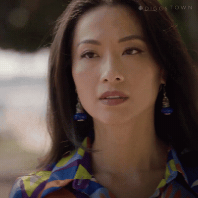 A Close Up Of A Woman 'S Face With The Hashtag #Diggstown Visible GIF