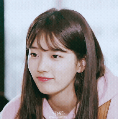 A Close Up Of A Woman 'S Face With The Hashtag Pccapture941010 On The Bottom GIF