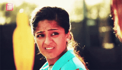 A Close Up Of A Woman 'S Face With The Letters Ii On It GIF