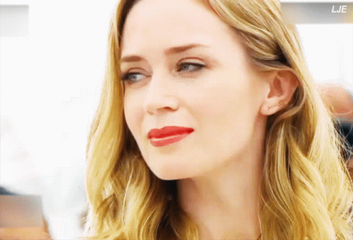 A Close Up Of A Woman 'S Face With The Letters Lje Visible GIF