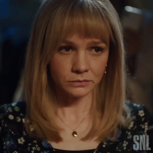 A Close Up Of A Woman 'S Face With The Letters Snl Visible GIF
