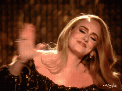 A Close Up Of A Woman 'S Face With The Name Adelajess On The Bottom Right GIF