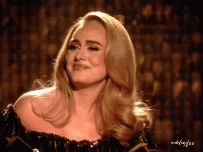 A Close Up Of A Woman 'S Face With The Name Adilajss Written On The Bottom Right GIF