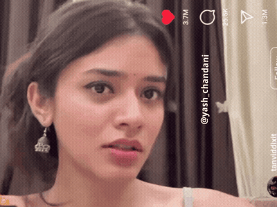 A Close Up Of A Woman 'S Face With The Name Yash Chandani On The Bottom Right GIF