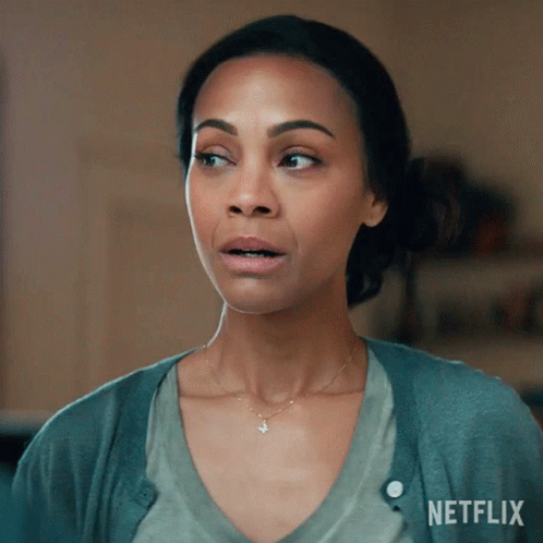 A Close Up Of A Woman 'S Face With The Netflix Logo In The Corner GIF