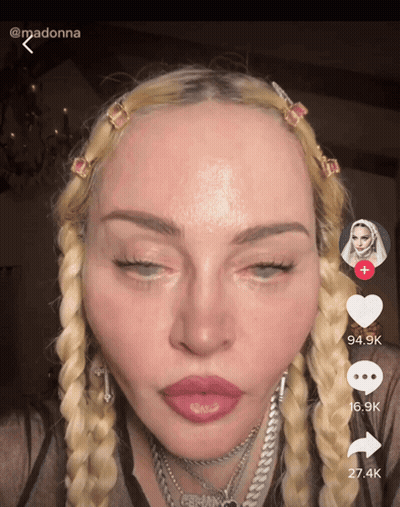 A Close Up Of A Woman 'S Face With The Number 27.4K On The Bottom GIF