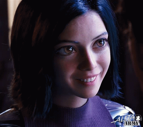 A Close Up Of A Woman 'S Face With The Word Alita Army On The Bottom Right GIF
