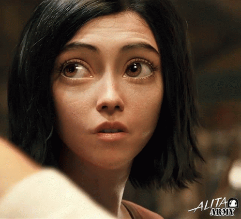 A Close Up Of A Woman 'S Face With The Word Alita Army On The Bottom Right GIF