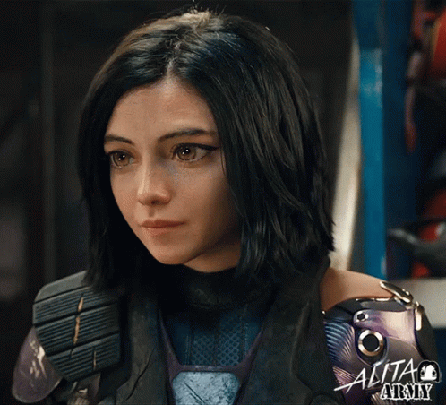 A Close Up Of A Woman 'S Face With The Word Alita At The Top GIF