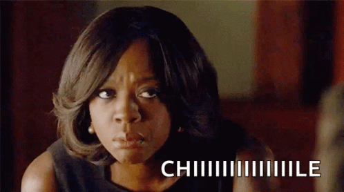 A Close Up Of A Woman 'S Face With The Word Chi Written In White Letters GIF