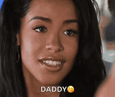 A Close Up Of A Woman 'S Face With The Word Daddy Written On It GIF