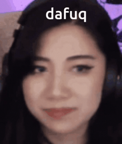 A Close Up Of A Woman 'S Face With The Word Dafug Written On Her Forehead . GIF