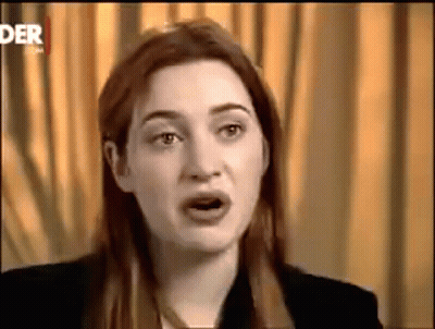 A Close Up Of A Woman 'S Face With The Word Der On The Bottom Right Corner GIF