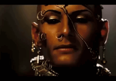 A Close Up Of A Woman 'S Face With The Word Done On The Bottom Right GIF