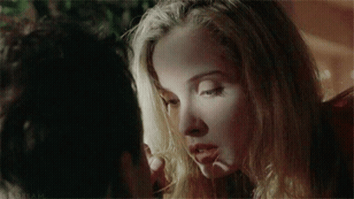 A Close Up Of A Woman 'S Face With The Word Dream On The Bottom Right Corner GIF