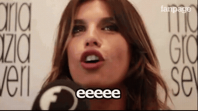 A Close Up Of A Woman 'S Face With The Word Eeeee Written On It . GIF