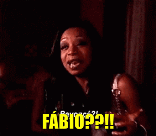 A Close Up Of A Woman 'S Face With The Word Fabio In Yellow GIF