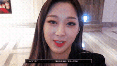 A Close Up Of A Woman 'S Face With The Word Giselle On The Bottom GIF