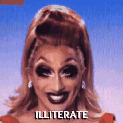 A Close Up Of A Woman 'S Face With The Word Illiterate On The Bottom GIF