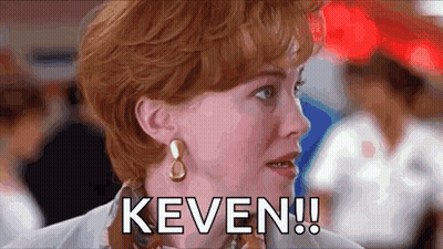 A Close Up Of A Woman 'S Face With The Word Keven Written On It . GIF
