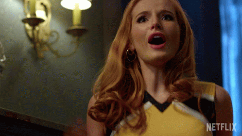 A Close Up Of A Woman 'S Face With The Word Netflix On The Bottom GIF