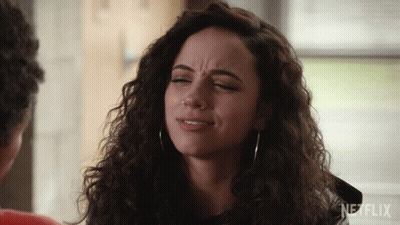 A Close Up Of A Woman 'S Face With The Word Netflix On The Bottom Right GIF
