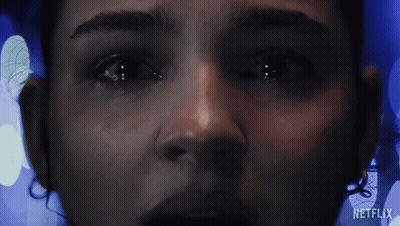 A Close Up Of A Woman 'S Face With The Word Netflix On The Bottom Right GIF